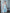 Mint Satin One-Shoulder Bow Skater Mini Dress - back view | ELAGIA