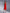 Red High Waist High Slit Midi Skirt - side view | ELAGIA