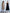 ELAGIA beige satin corseted strapless dress full length styled shot with purple business suit women aesthetic