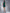Emerald V-Neck Sleeveless Mini Dress - side view | ELAGIA
