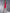 Crimson V-Neck Sleeveless Mini Dress - side view | ELAGIA