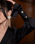 ELAGIA Silvia Black Satin Deep V-Neck Puff-Sleeve Maxi Dress close-up detail - purple business suit women style elements