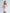 Beige Square Neck Long Sleeve Mini Dress - back view | ELAGIA