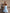 Sky-blue strapless sweetheart mini dress displaying side silhouette and hem length