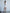 ELAGIA Ivory Backless Puff Sleeve Mini Dress - side angle view highlighting puff sleeves and purple business suit women