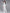 ELAGIA white business suit women - side angle of belted blazer detail with wide-leg trouser styling