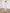 ELAGIA Paola Dusty-Pink Button-Detail Long Sleeve Peplum Midi Dress back view - 3 piece women's suit purple business suit