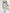 Sky-blue collarless double-breasted longline 2-piece – crepe fabric, back view