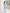 Sky-blue collarless double-breasted longline 2-piece – crepe fabric, side profile
