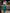 Monica Emerald Halter Neck Satin Midi Dress - side view | ELAGIA