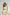 ELAGIA yellow sleeveless top detail shot with wide-leg pants set - modern 3 piece women's suit style