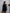 Black tweed peplum blazer and mini skirt 2-piece – structured back silhouette, rear view