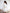 White tweed peplum blazer and mini skirt two-piece – structured tweed fabric with peplum detail, side view