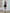 Monica Black Satin Strapless Mini Dress - side view | ELAGIA