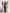 Brown satin strappy asymmetric ruffle maxi – close-up of asymmetric ruffle trim
