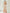ELAGIA beige jumpsuit front view - strapless v neck jumpsuit with wide legs and tailored fit