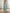 Gloria Olive Open-Back Halter-Neck Midi Dress - close-up detail | ELAGIA