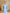 Monica Sky-Blue Satin V-Neck Puff Sleeve Midi Dress - back view | ELAGIA