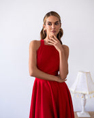 Julie Red Halter Neck Midi – crepe construction, side profile revealing drape and fit