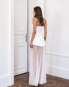 White satin strapless peplum maxi – corseted back with sheer overlay, rear view