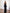 Black satin strapless peplum sheer skirt maxi with corseted bodice, front view