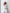 White single-breasted gold-button suit – crepe fabric, side profile