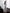 White Satin V-Neck Asymmetric Ruffle Midi – back view displaying elegant wrap design and cascading ruffles