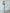 Sky-Blue Satin Draped Neck One-Shoulder Maxi Dress - side view | ELAGIA