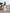 Céline White Satin Strapless Peplum Sheer Skirt Maxi Dress - back view | ELAGIA