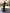 Nova Black Satin High-Neck Puff-Sleeve Maxi Dress - front view | ELAGIA
