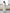Céline White Off-Shoulder Draped-Bow Midi Dress - front view | ELAGIA