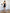 Black Strapless V-neck Asymmetric Mini Dress - back view | ELAGIA