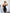 Black Strapless V-neck Asymmetric Mini Dress - front view | ELAGIA