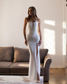 ELAGIA Selina white corset top & high-slit maxi skirt 2-piece set front view, white women suit style