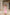 Pink Off-The-Shoulder Draped Sleeve Midi Dress - side view | ELAGIA