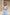 Sky-Blue Off-The-Shoulder Draped Sleeve Midi Dress - back view | ELAGIA