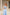 Sky-Blue Off-The-Shoulder Draped Sleeve Midi Dress - close-up detail | ELAGIA