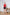 Black Button Pleated Mini Skirt - front view | ELAGIA
