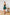 Emerald Satin Strapless Flared Mini Dress - close-up detail | ELAGIA