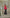 Red Strapless Peplum Sheer Flared Skirt Dress - side view | ELAGIA