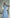 Sky-Blue Puff-Sleeve Ruffle-Hem Midi – Crepe fabric, back view displaying ruffle hem detail
