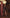 Monica Brown Deep V-neck Long-Sleeve Mini Dress - side view | ELAGIA
