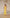 Kaia Yellow Satin Halter-Neck Open-Back Maxi Dress - side view | ELAGIA
