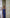 Stella Blue Satin Off-the-Shoulder High-Slit Maxi Dress - side view | ELAGIA