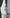 Sky-blue collarless gold-button single-breasted two-piece – crepe fabric, back view