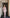 Pink square-neck double-breasted suit in crepe fabric, back view displaying clean lines and fitted silhouette