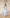 Kaia Sky-Blue Satin Halter-Neck Open-Back Maxi Dress - side view | ELAGIA