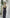 ELAGIA womens black suit - back view of black satin wide-leg jumpsuit displaying elegant drape and cut