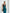ELAGIA Green-Black Backless Halter Midi Dress styled detail shot - 3 piece women's suit modern interpretation