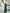 ELAGIA Emerald jumpsuit detail shot - strapless v neck jumpsuit neckline and bodice construction close-up